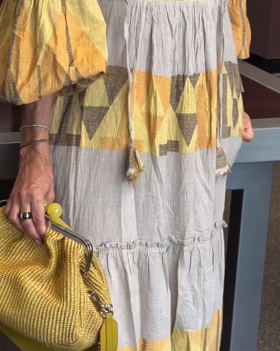 V-hals løs kjole med klokkeermer