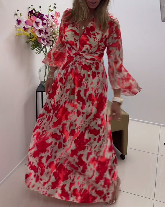 Fasjonabel strikket kjole med trykk med dyp v og klokkeerm