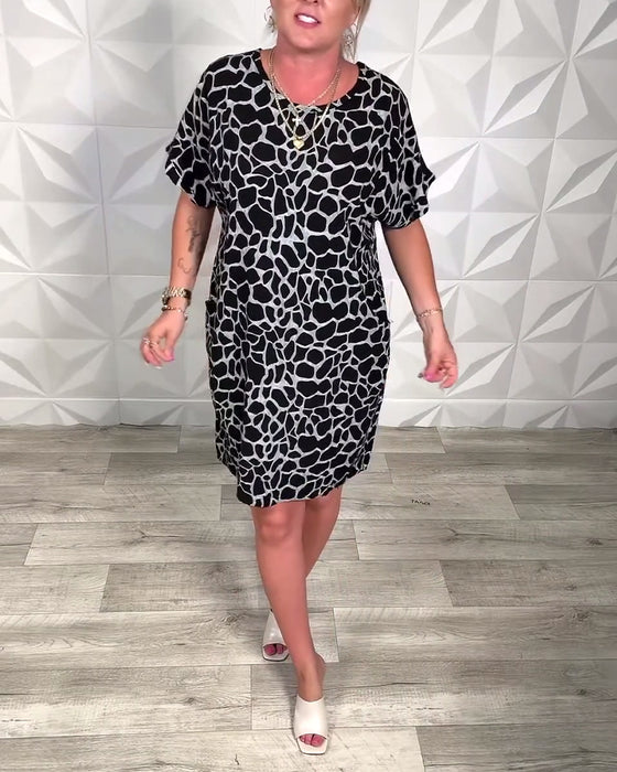 Kjole med rund hals og trykk