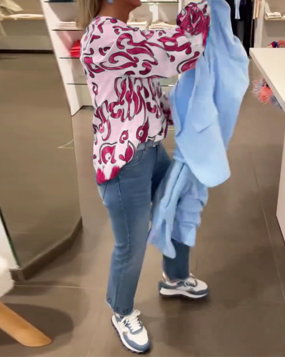 Elegant langermet topp med trykt V-hals