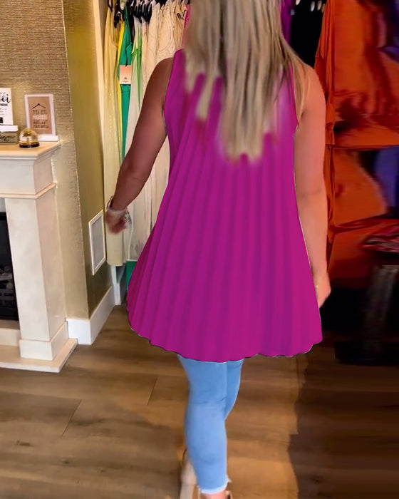 Ermeløs topp med volanger og jakkeslag