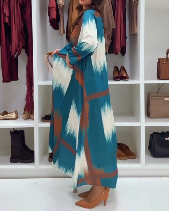 Stilfull Trykt Kjole Med Rund Hals Og Lange Ermer