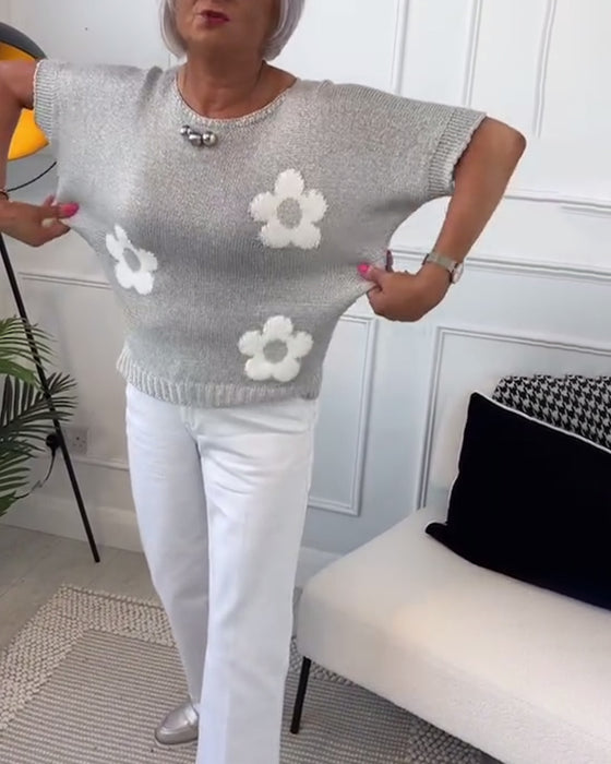 Slank blomstergenser med rund hals