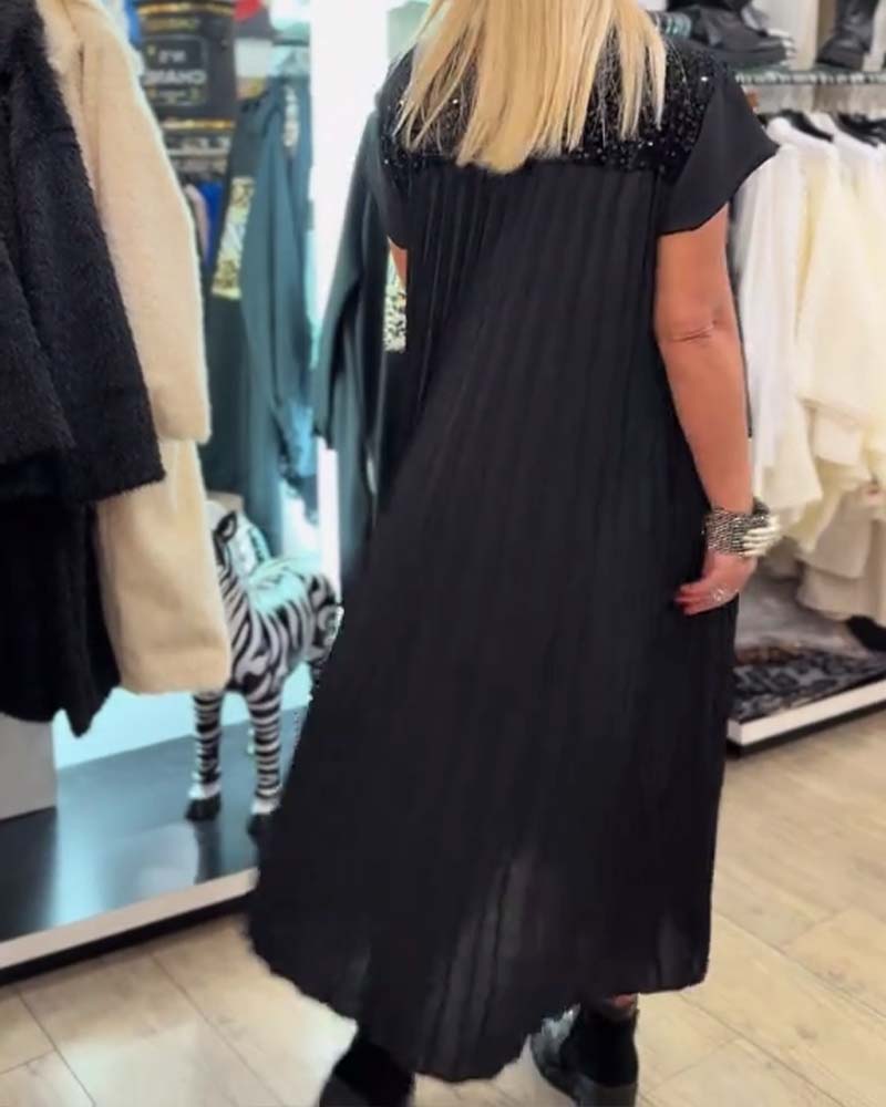 Fasjonabel paljettkjole med korte ermer