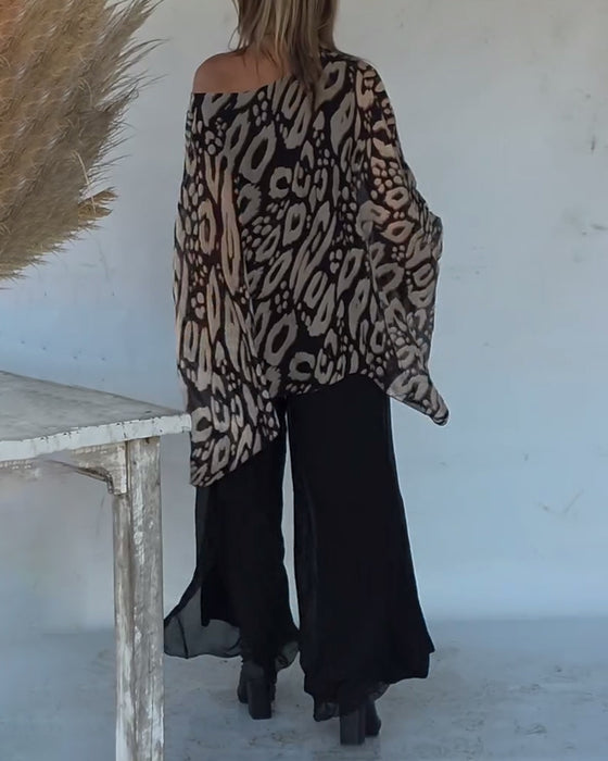 Uregelmessig Bluse Med Flaggermustrykk Og Lange Ermer