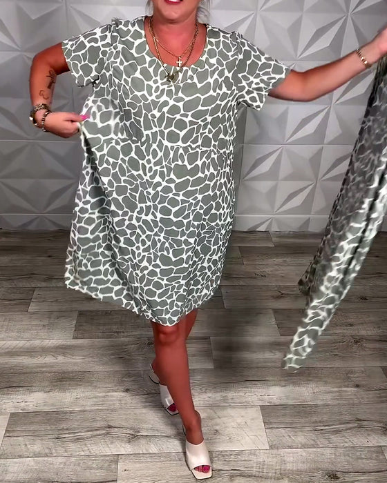 Kjole med rund hals og trykk