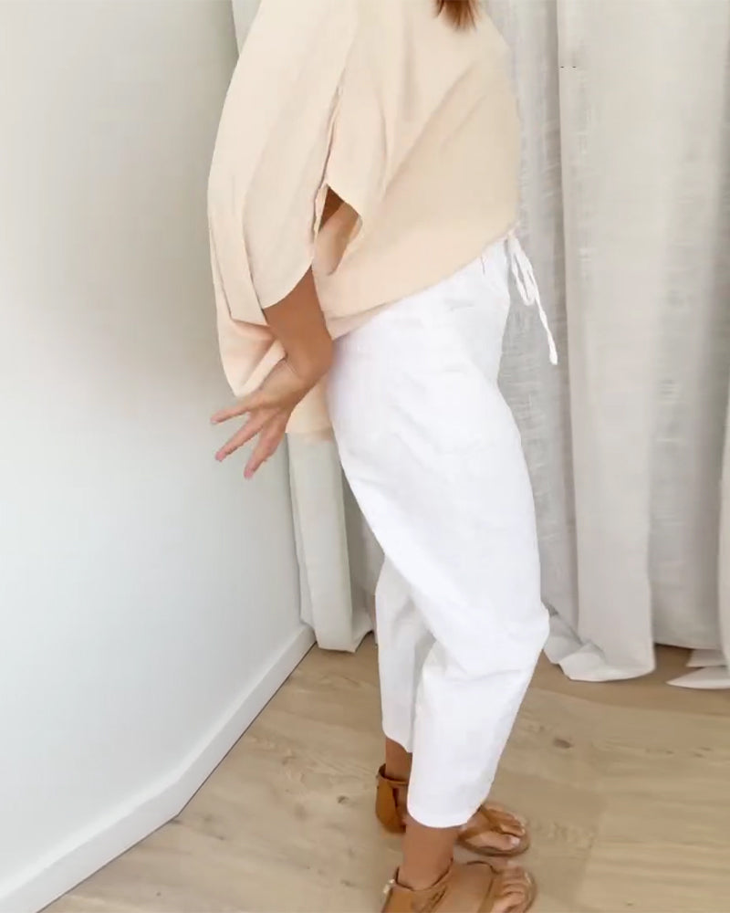 Bukser I Denim Med Lommer Og Kort Lengde