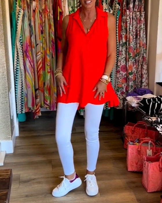 Ermeløs topp med volanger og jakkeslag