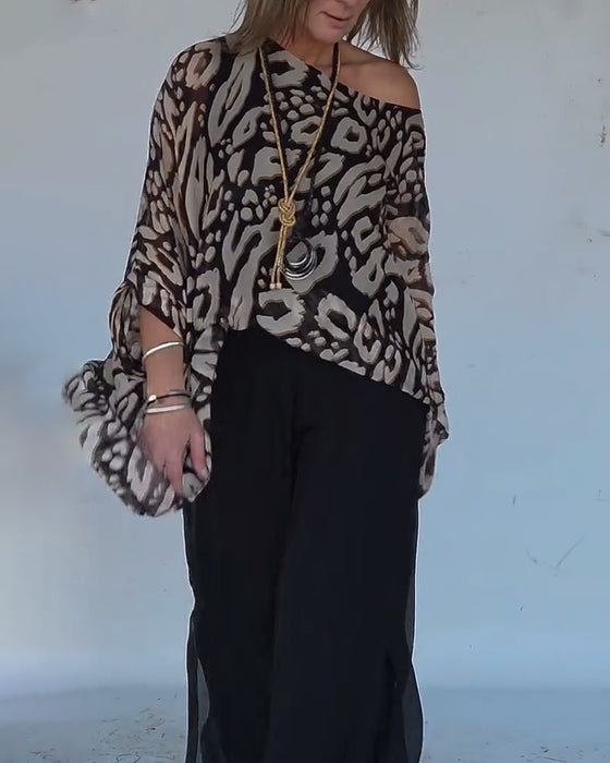 Uregelmessig Bluse Med Flaggermustrykk Og Lange Ermer