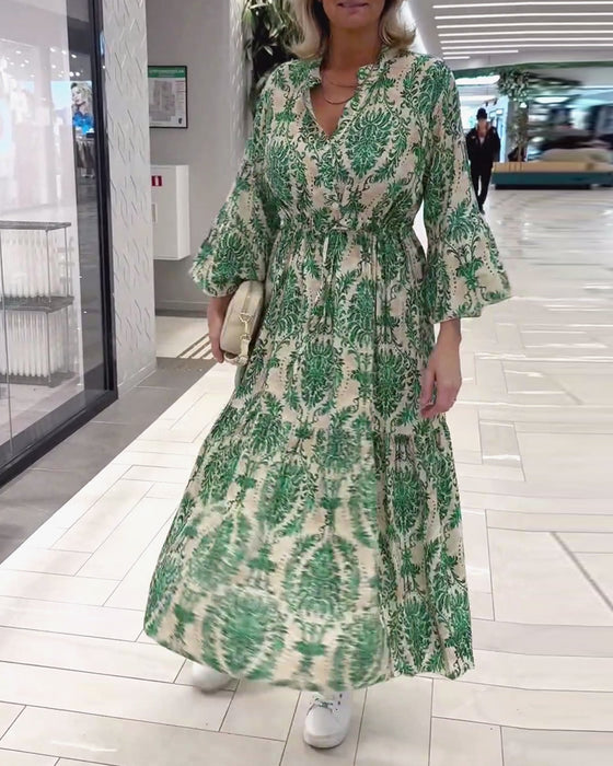 Kjole med snøring med klokkeermer