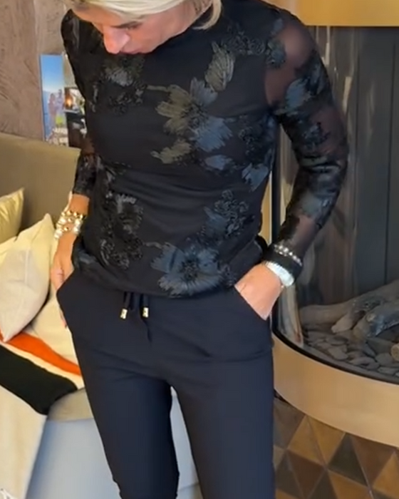 Stilfull Topp Med Rund Hals Og Lange Ermer