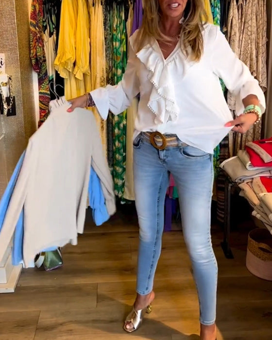 Designerbluser med volang for kvinner