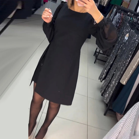 Elegant ensfarget kjole