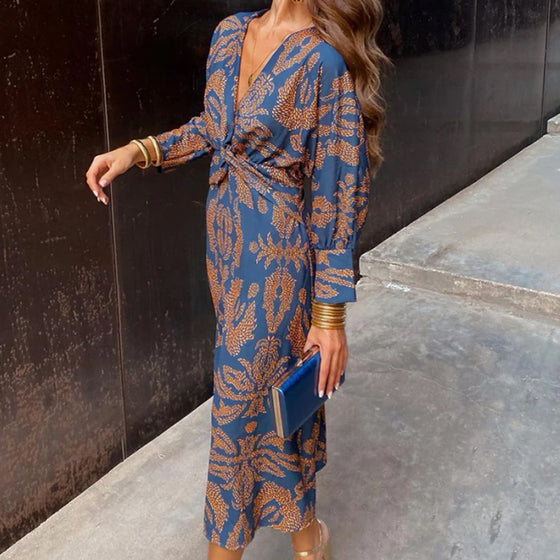 Langermet elegant kjole med vintage-trykk med V-hals