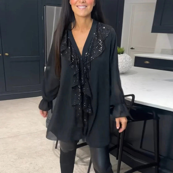 Bluse med volanger og elegant stil