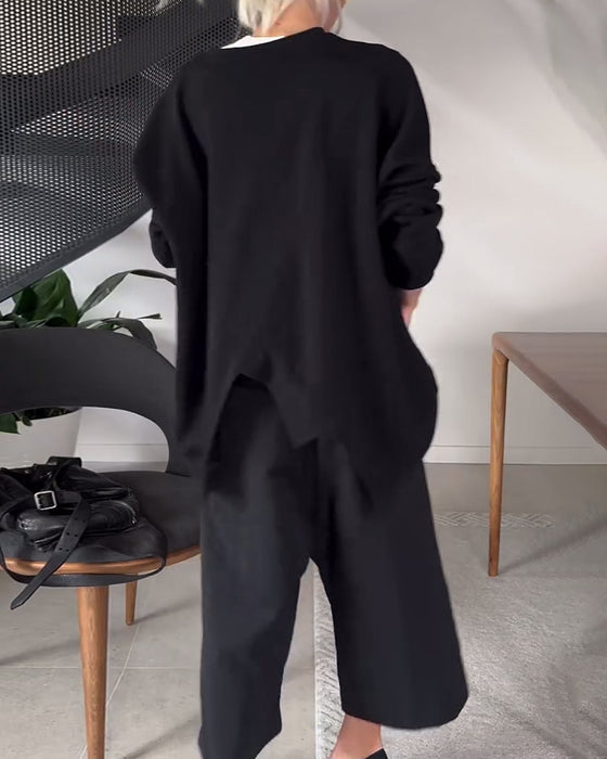 Ensfarget casual genser med rund hals og splitt