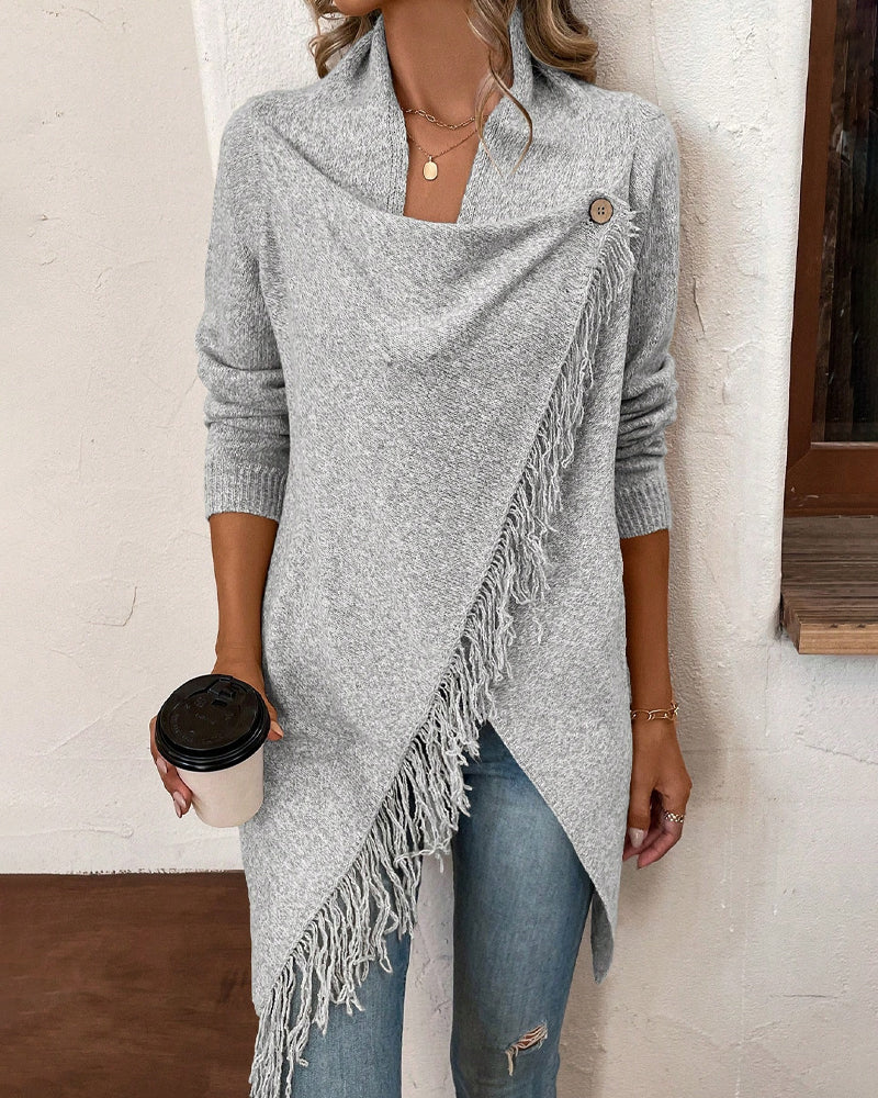 Genser Med Asymmetrisk Design, Fransede Detaljer Og Strikket Stoff