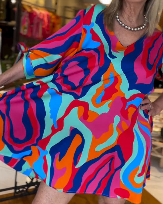 Løs kjole med rund hals og trykk