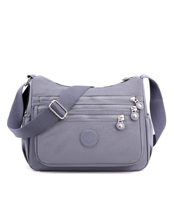 ⌛ Tidsbegrenset Tilbud – Lett Vannavstøtende Crossbody Veske 👜