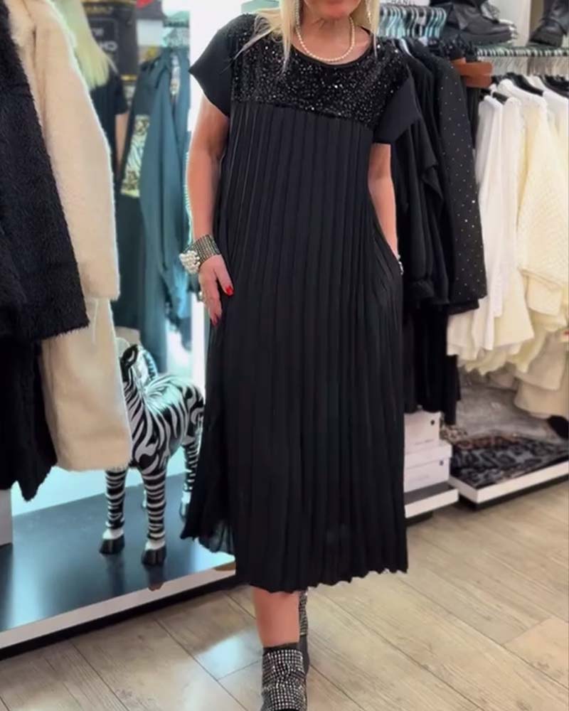 Fasjonabel paljettkjole med korte ermer