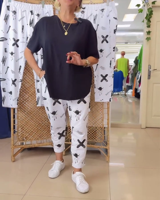 Bukser med middels høy avslappet print