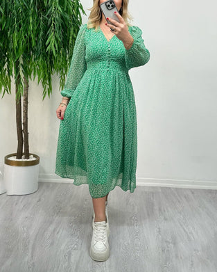 Elegant kjole med trykk med knapper