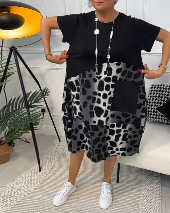 Kortermet kjole med rund hals