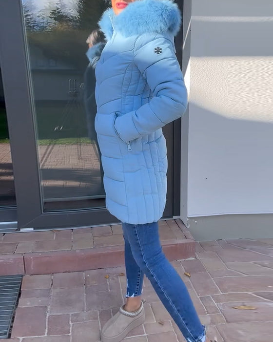 Uformell ensfarget polstret jakke med glidelåslomme