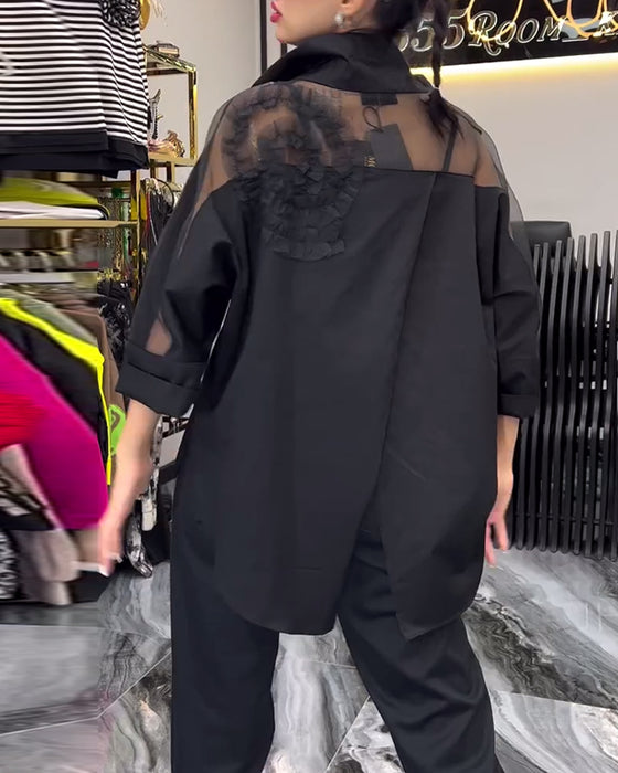 Lapel-blonde med lappeteppe blomsterbluse