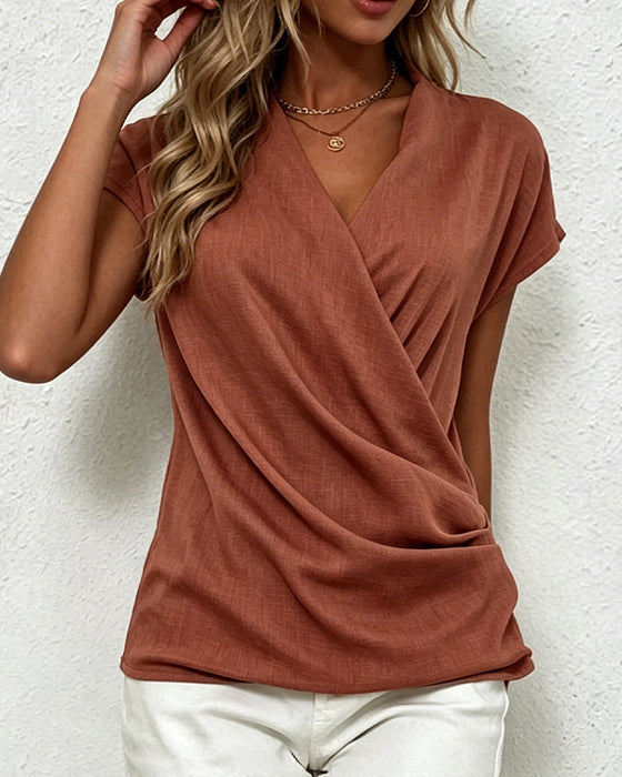 Bluse Med Kryssede Folder