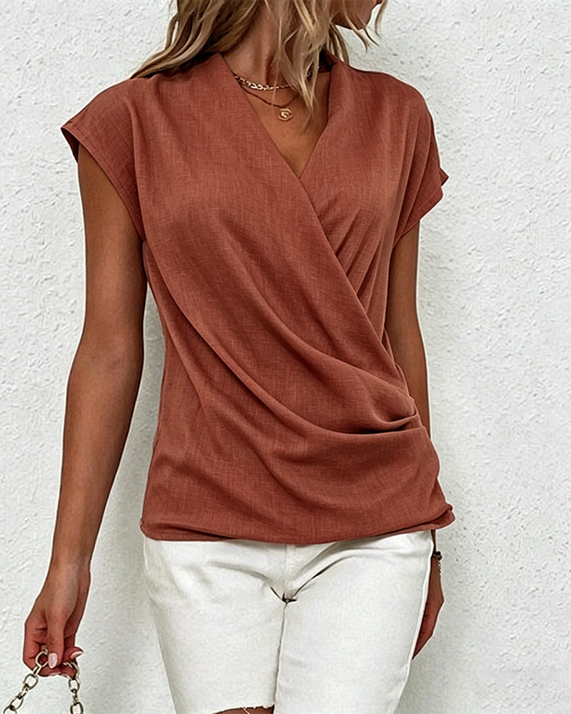 Bluse Med Kryssede Folder