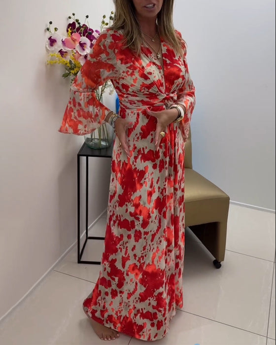 Fasjonabel strikket kjole med trykk med dyp v og klokkeerm