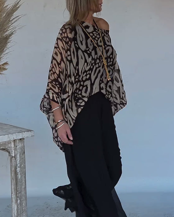 Uregelmessig Bluse Med Flaggermustrykk Og Lange Ermer