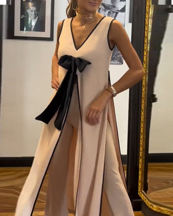 Elegant ensfarget ermeløs sløyfedress