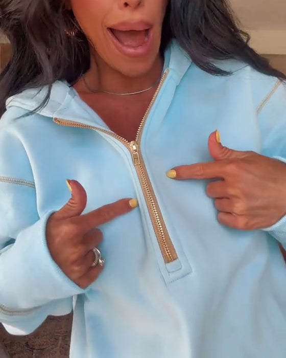 Genser med avslappet hette og ensfarget glidelås