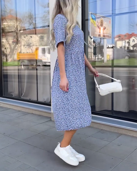 Blomstret kjole med midtermer