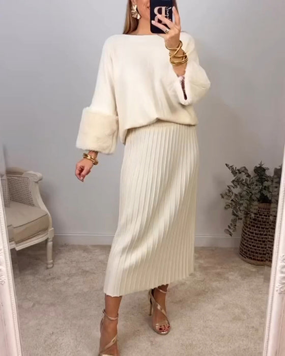 Elegant ensfarget genser med lange ermer