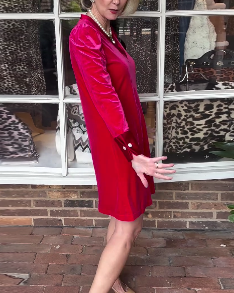 Elegant kjole med v-hals og ensfarget farge