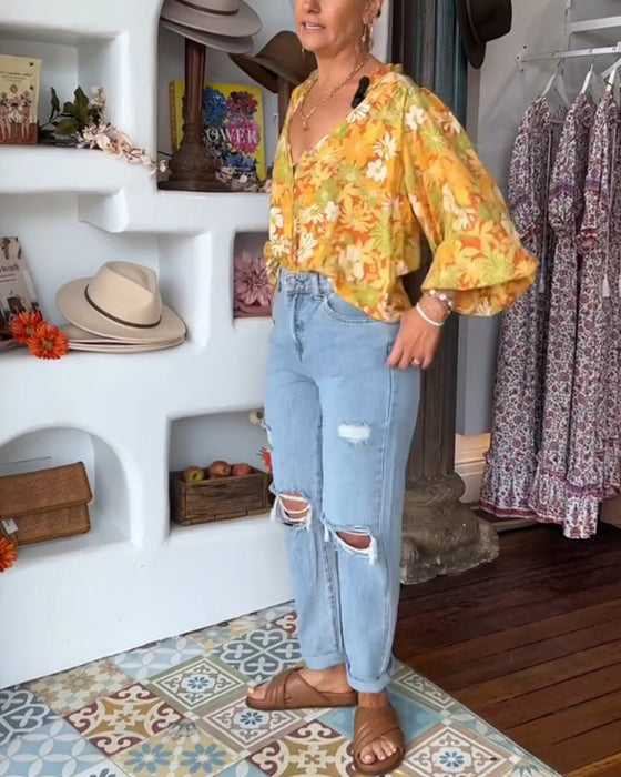 V-hals bluse med blomstertrykk