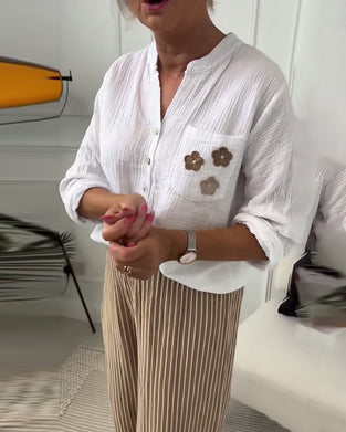 Uformell bluse med lang ermet lomme med blomstertrykk