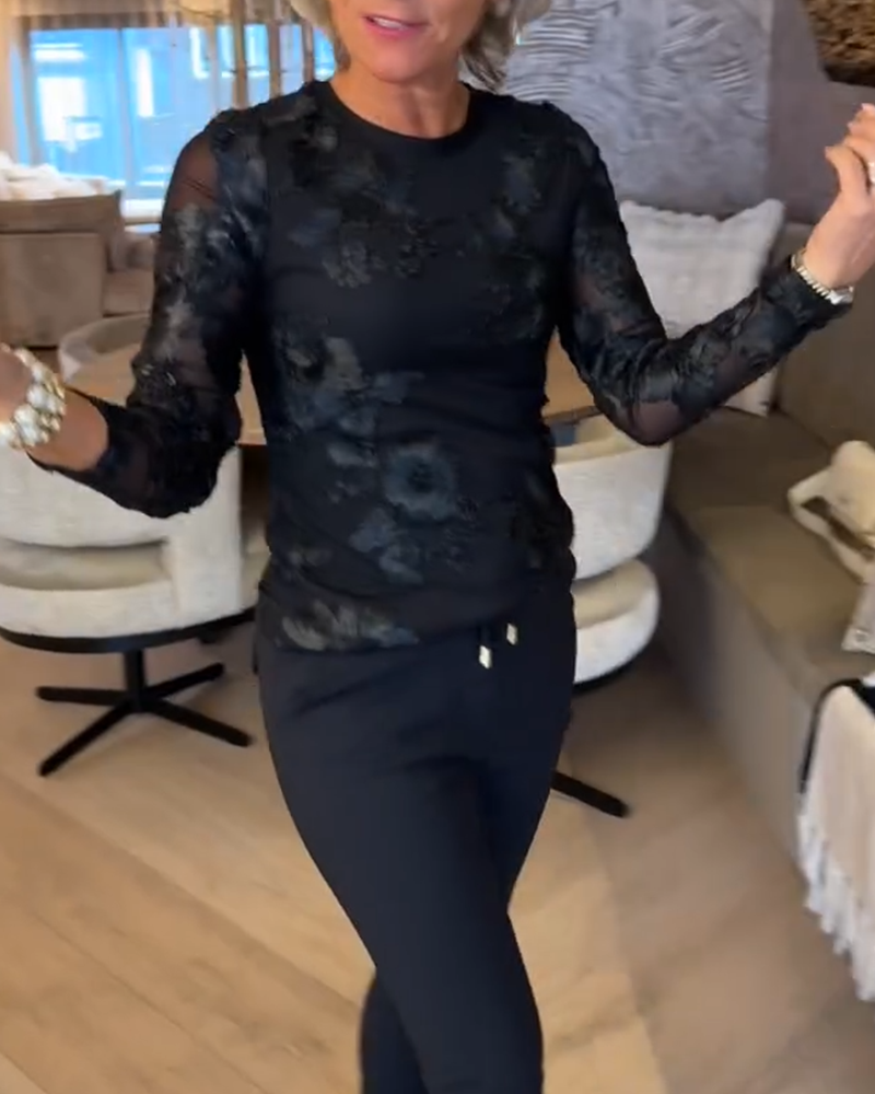 Stilfull Topp Med Rund Hals Og Lange Ermer