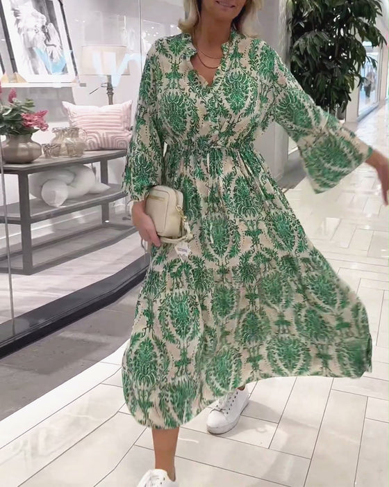 Kjole med snøring med klokkeermer