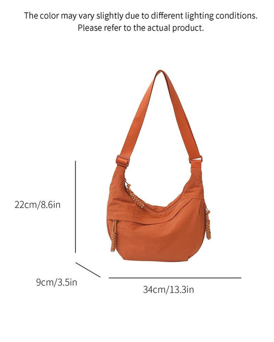 Nylon Dumpling Axelremsväska