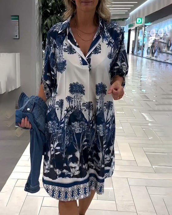 Uformell kjole med trekvart ermer i jakkeslag med botanisk trykk