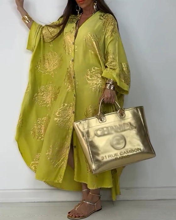 Langermet løs kjole med trykt knapp