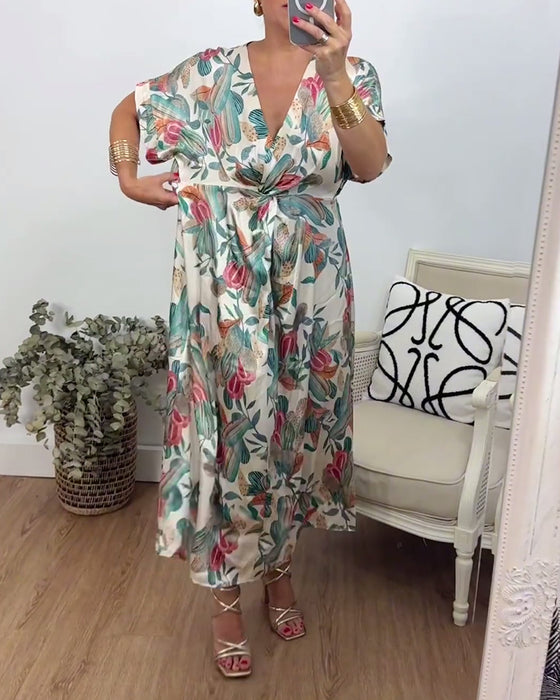 Elegant kjole med v-hals med botanisk trykk