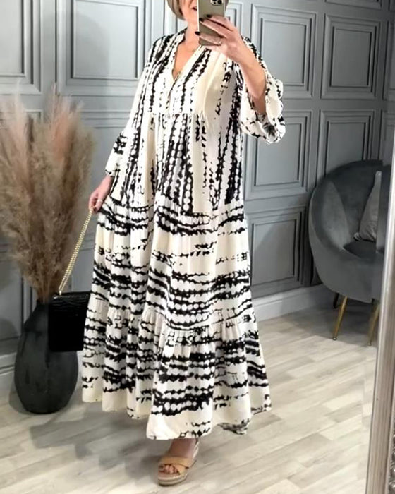 Uformell kjole med klokkeerm med kontrasttrykk