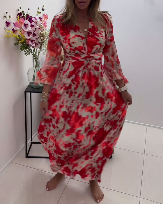 Fasjonabel strikket kjole med trykk med dyp v og klokkeerm