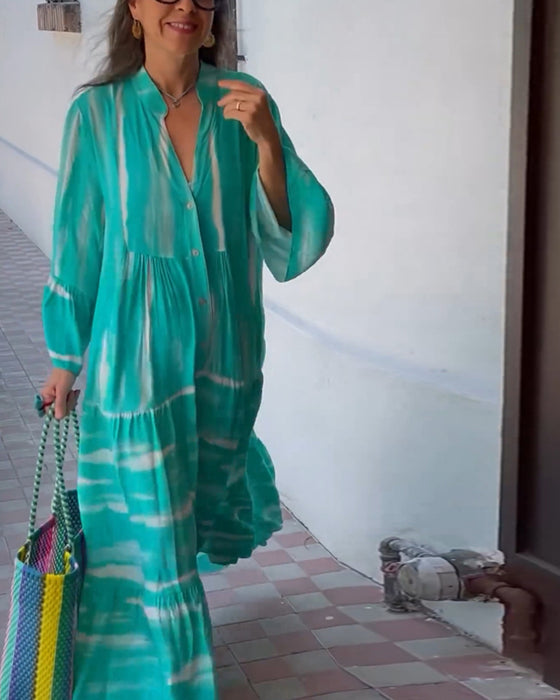 Uformell, løs lang kjole med V-hals og flare ermer