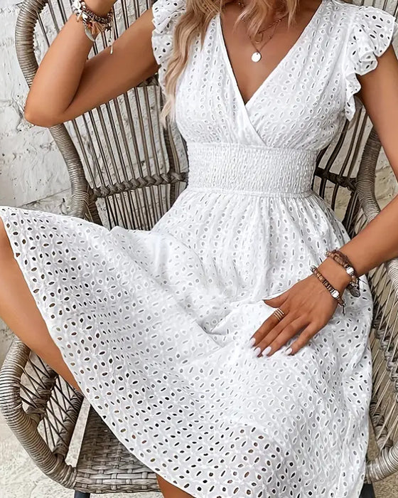 Ensfarget kjole med dyp V-midje